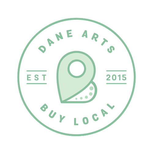 DABL Logo: light green map pin icon in the center of a circle. Text reads DANE ARTS BUY LOCAL EST 2015