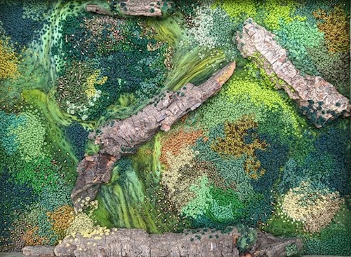 Embroidered textures making an abstracted composition of swirling shades of green around pieces of brown tree bark.  